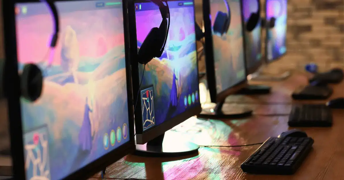 a row of gaming monitors 