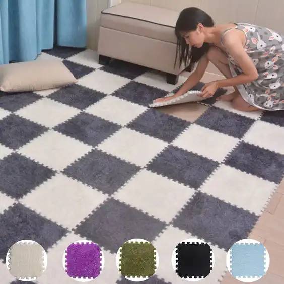 girl placing rubber puzzle mats