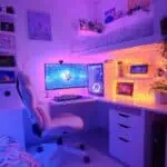 Minimalist gamer girl bedroom with soft lighting and white furniture.